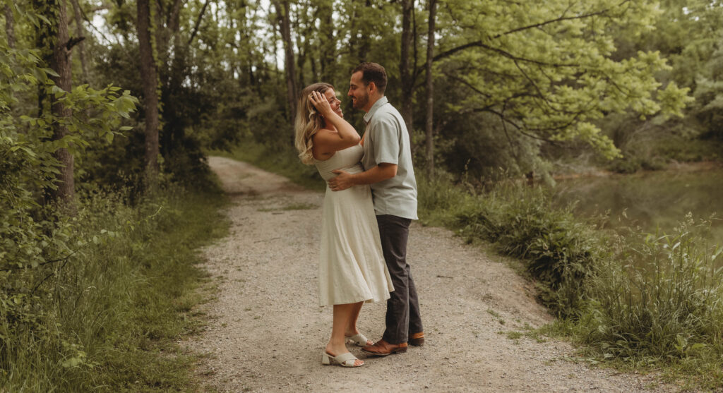 A couple dance and play together on a trail at Heritage Community Park in Blacksburg, Virginia.