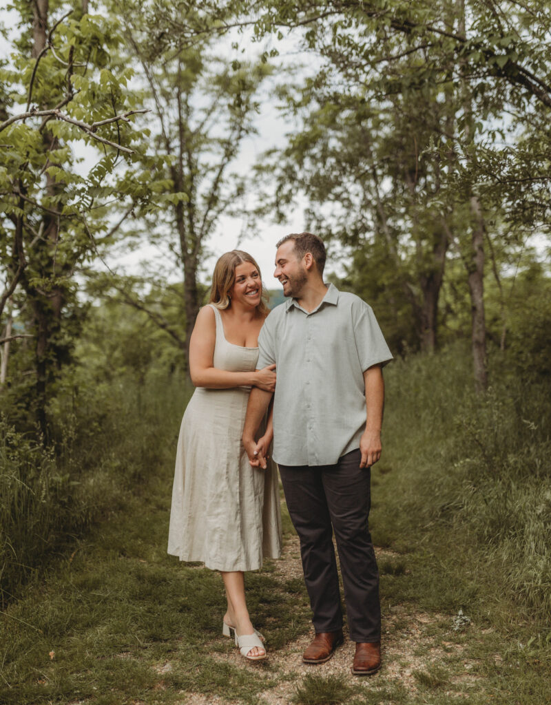 A couple lovingly look at one another at Heritage Community Park in Blacksburg, Virginia.