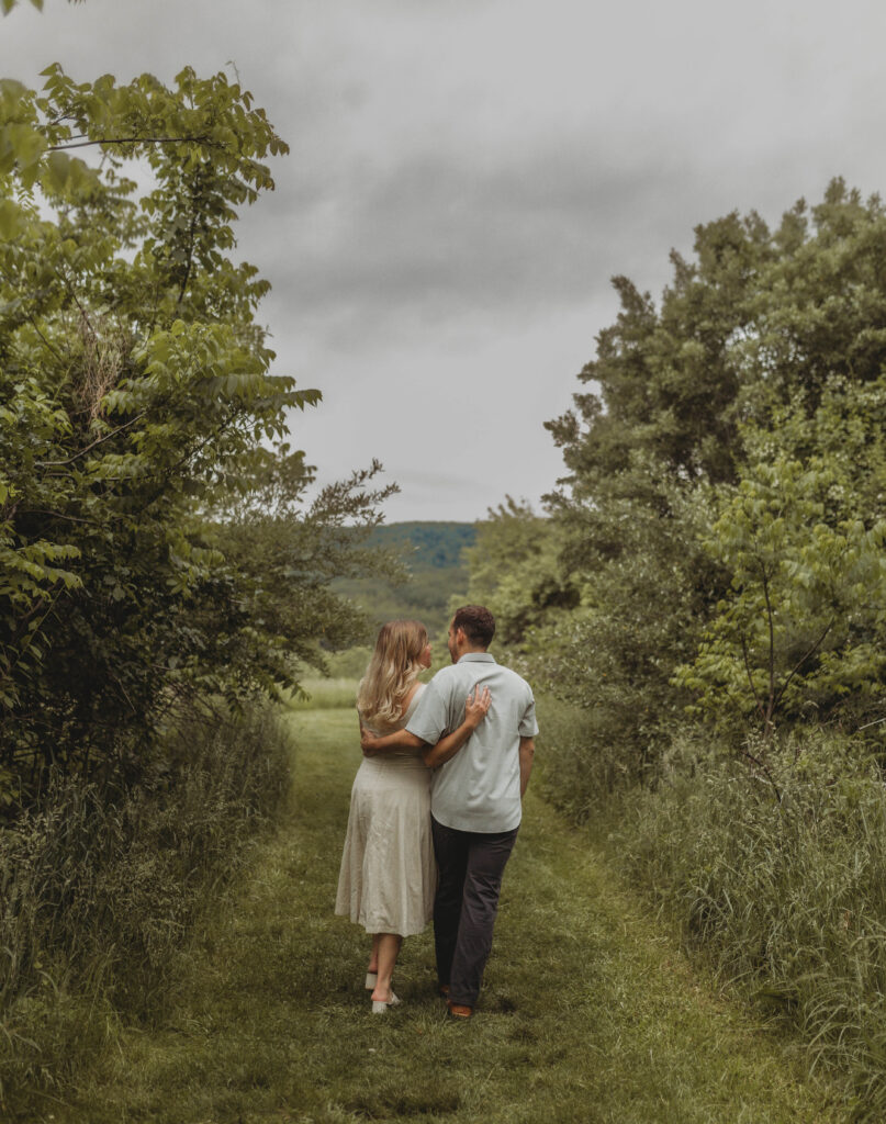 A couple embrace during engagement photos in Blacksburg, Virginia.