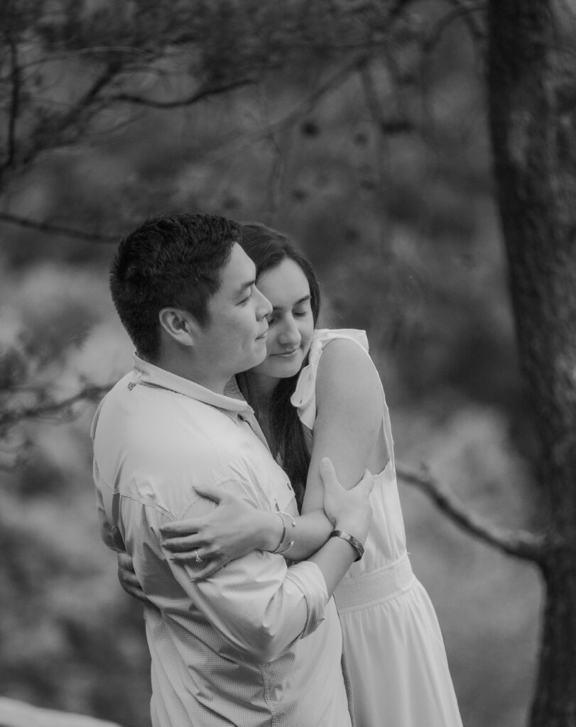 Couple embraces for sweet moment during New River Gorge engagement photos