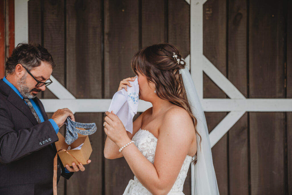 A bride wiping her tears 
