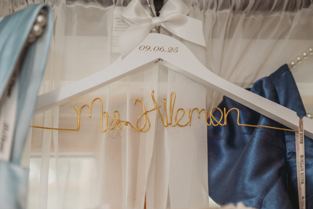 Hanger with brides name at a Vintage Valley Wedding. 