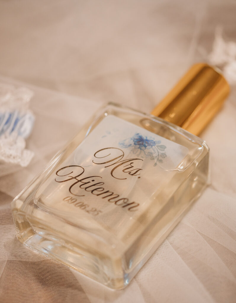A photo of perfume with name of bride