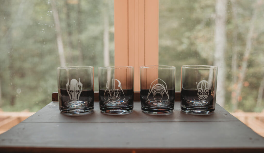 Star wars cups sitting on a table