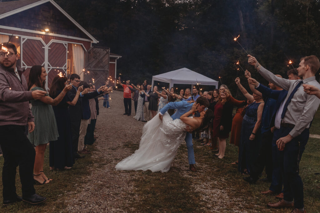 The groom dips the bride at a Vintage Valley Wedding. 