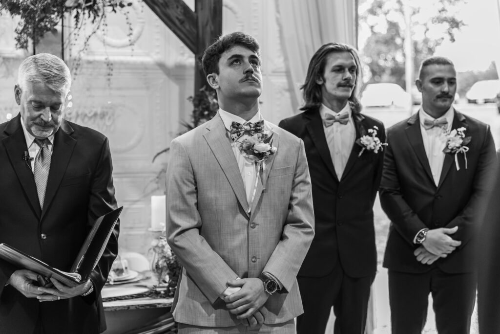 A groom crying after seeing his bride 