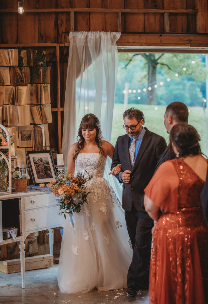 A dad walking bride down the aisle at a Vintage Valley Wedding. 